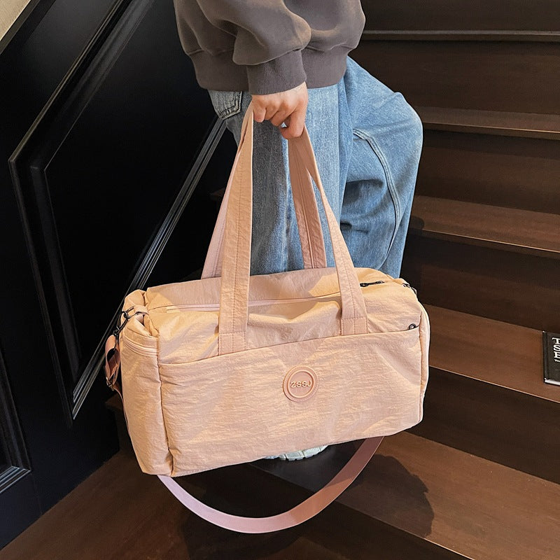 Sporty travel bag with practical exterior pockets Kalsten