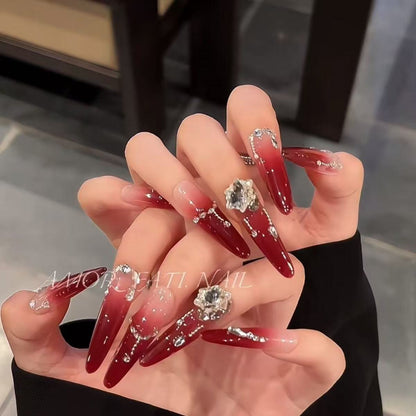 Glamorous artificial nail tips with elegant decorations Acalora