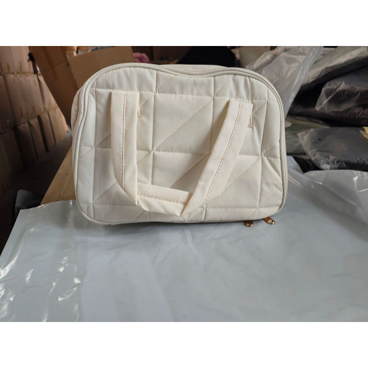 Cosmetic bag with padded interior compartment Kalsten