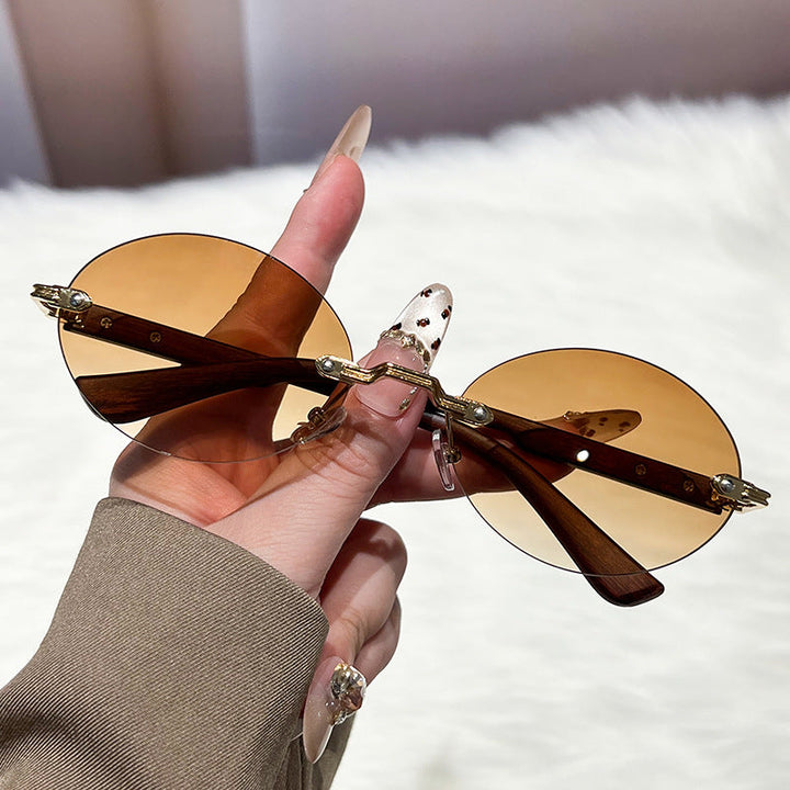 Ladies fashionable and elegant sunglasses with oval design Kalsten