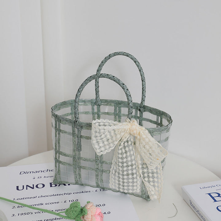 Handcrafted basket bag with elegant bow applique Kalsten