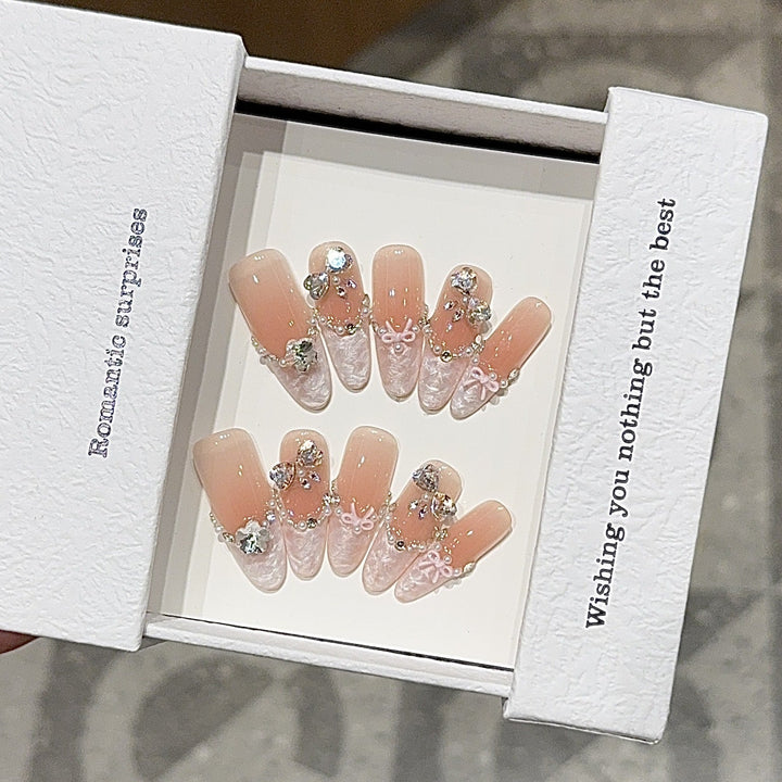 Artificial nails with romantic rhinestone details Kalsten