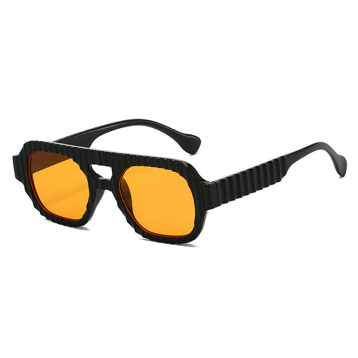 Ladies fashionable sunglasses in futuristic design with textured frame Kalsten