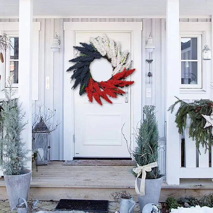 Unisex hanging floral swag with large bow and artificial berry branches Kalsten