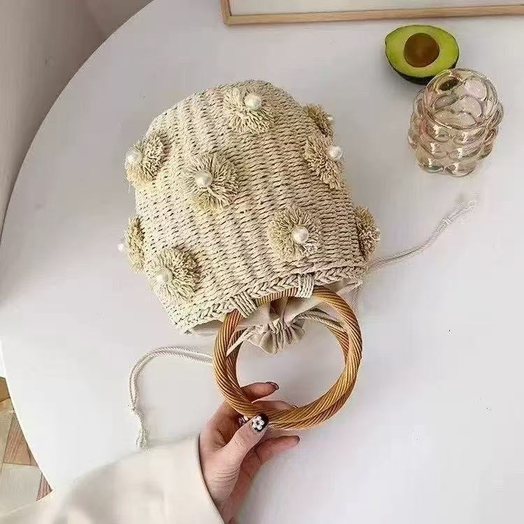 Refined handbag with pearl applications Kalsten