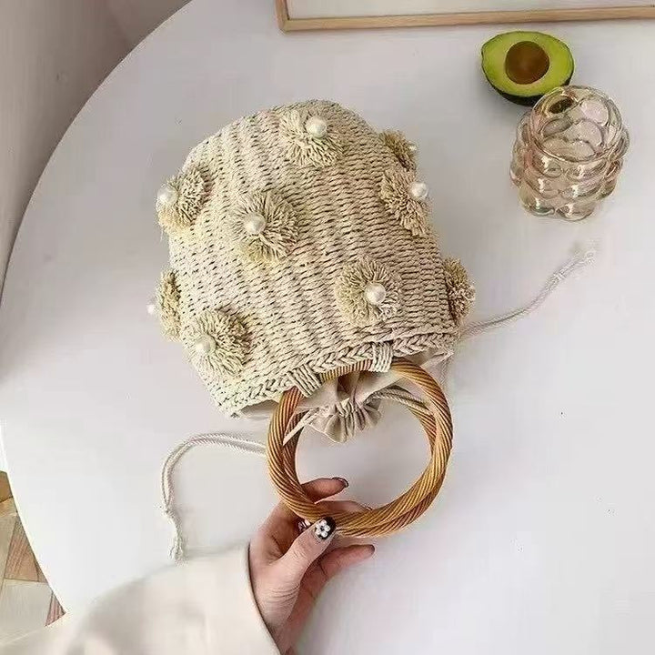 Refined handbag with pearl applications Kalsten