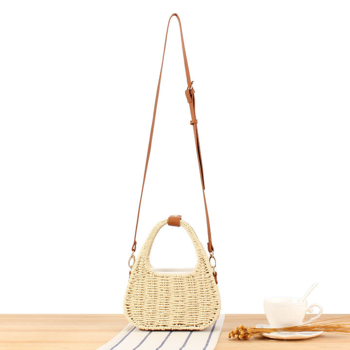 Shoulder bag made of woven natural material with elegant leather accent Kalsten