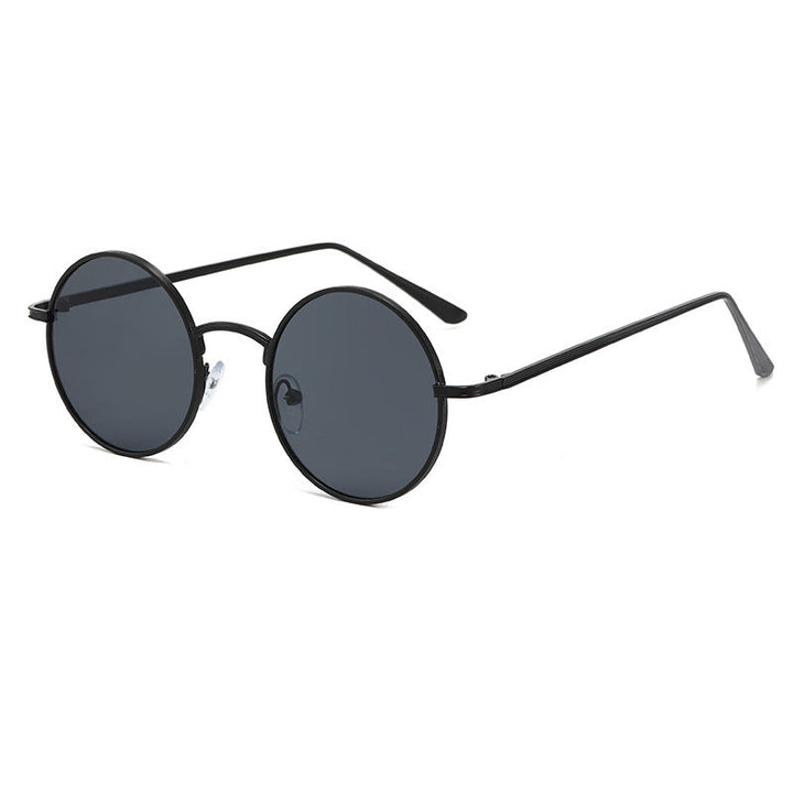Ladies fashionable glasses with round lenses and fine metal frame Kalsten