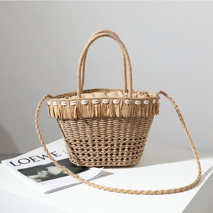 Braided straw bag with decorative tassel detail Kalsten