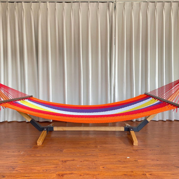 Woven cotton hammock with wooden spreader bars and freestanding stand Kalsten
