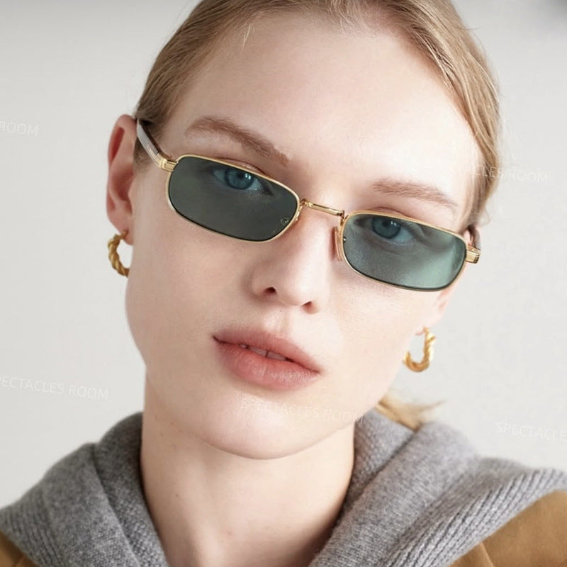 Ladies fashionable sunglasses with stylish metal frame and orange lenses Kalsten