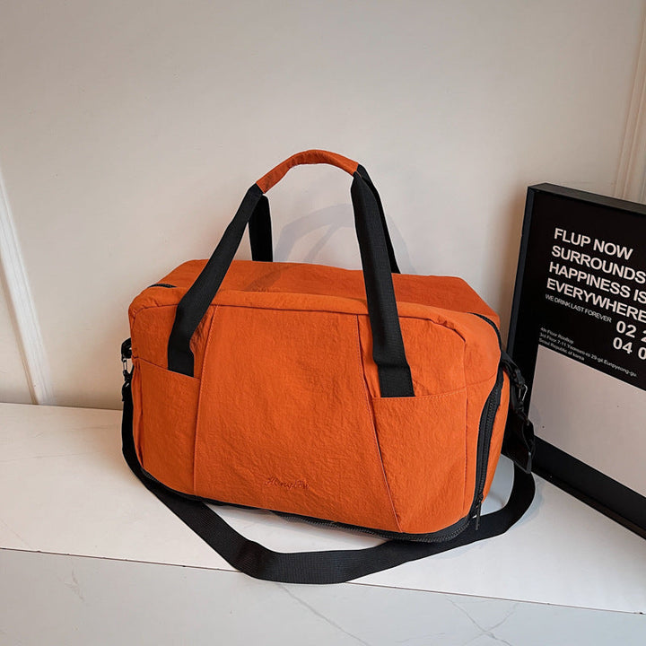 Sporty travel bag with practical outer pockets Kalsten