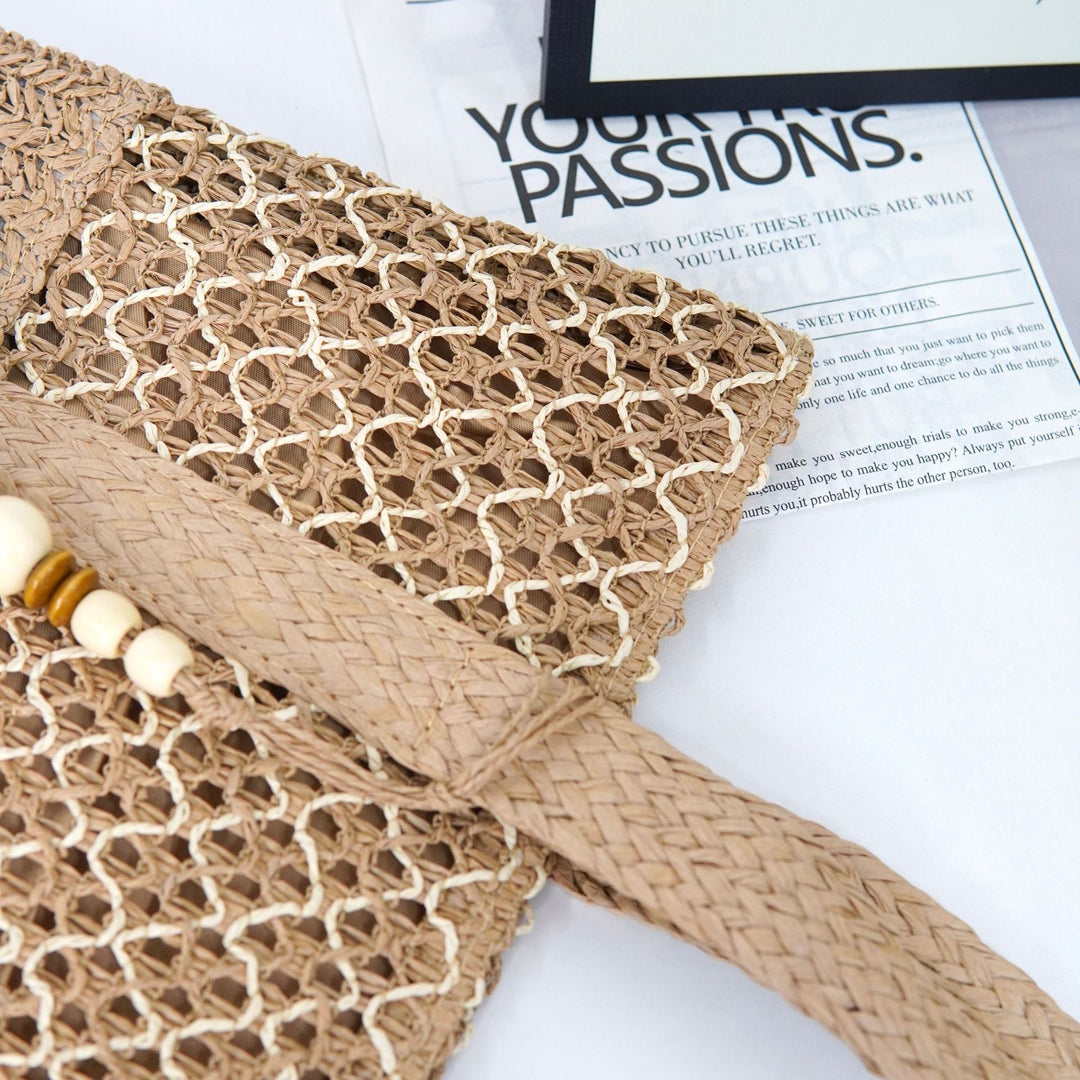 Beach bag with mesh structure and tassel details Kalsten