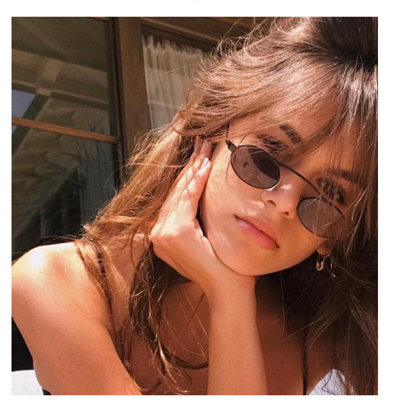 Women’s fashionable sunglasses with a unique circular frame and distinctive lenses Kalsten