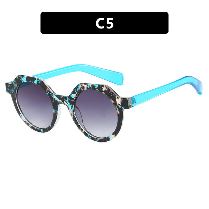 Ladies extravagant round sunglasses with colored accented frame Kalsten