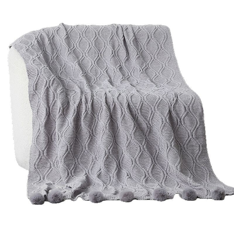 Ladies knit blanket with decorative pom poms Kalsten