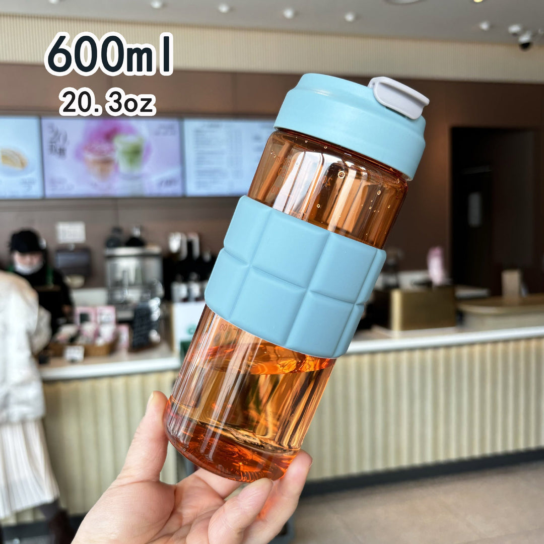Women's transparent drinking bottle with non-slip silicone coating Kalsten