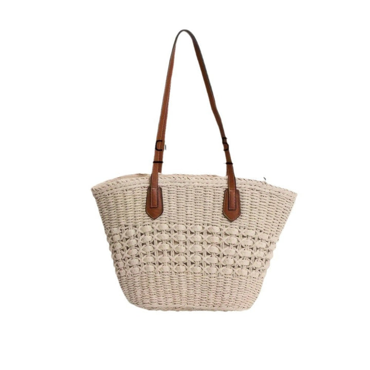 Handbag made of woven natural material with elegant leather handles Kalsten