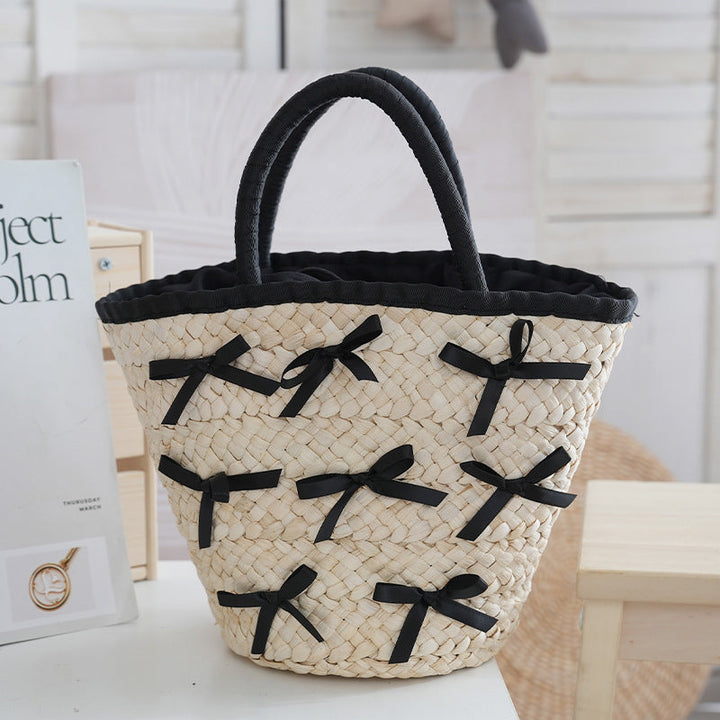 Basket bag with delicate bows and Kalsten lining