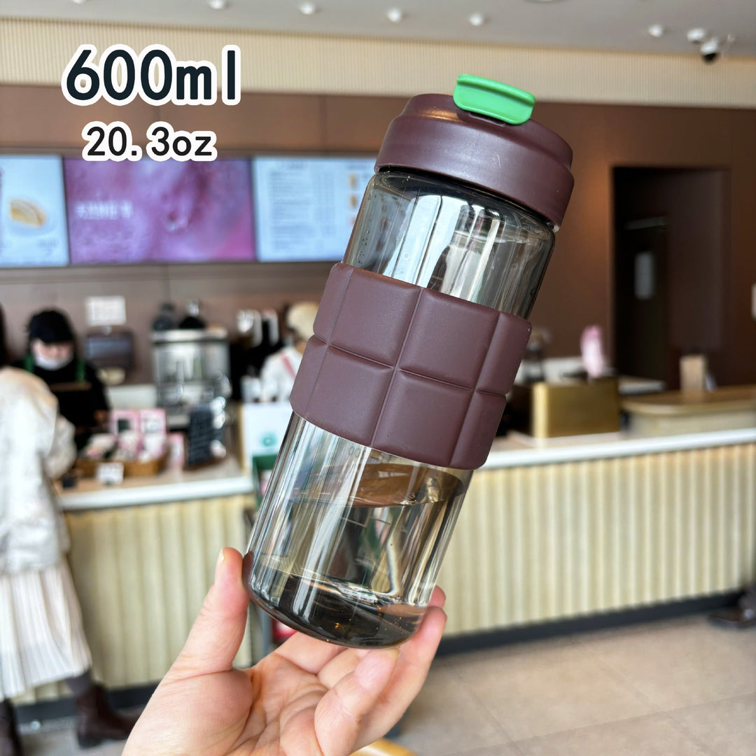 Women's transparent drinking bottle with non-slip silicone coating Kalsten
