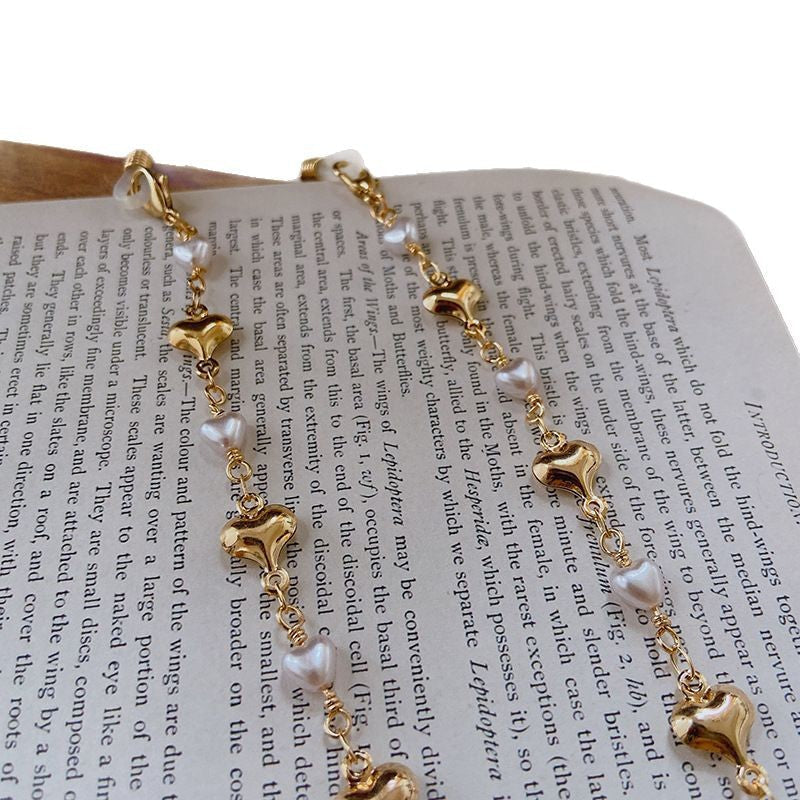Fashionable necklace with pearls and golden accents Kalsten