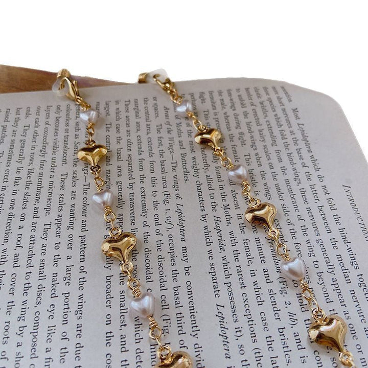 Fashionable necklace with pearls and golden accents Kalsten