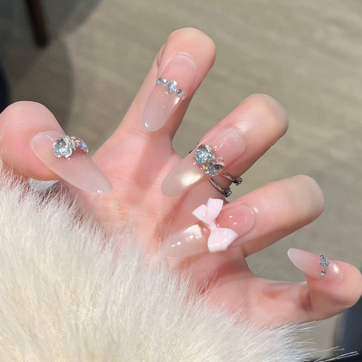 Elegant Nail Art Extensions with Pearl Accents Kalsten