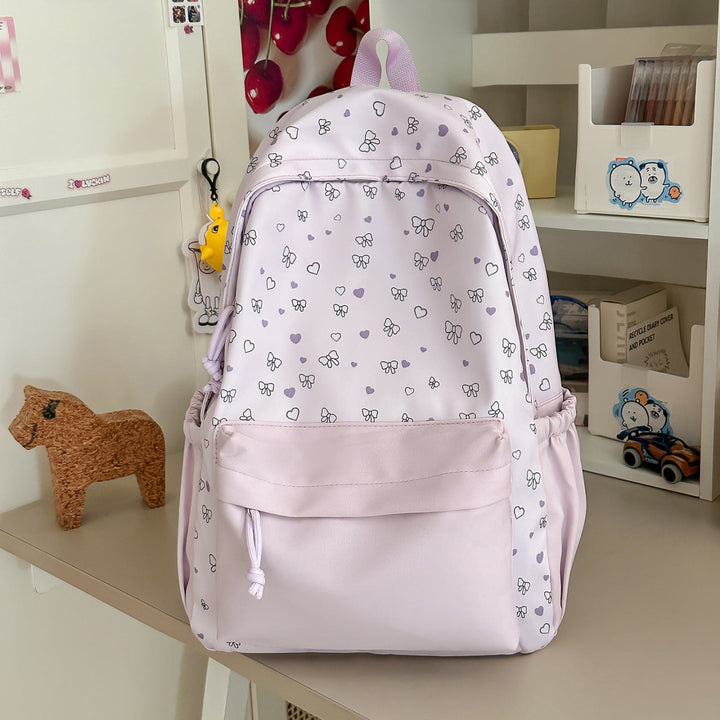 Playful Heart and Bow Patterned Backpack