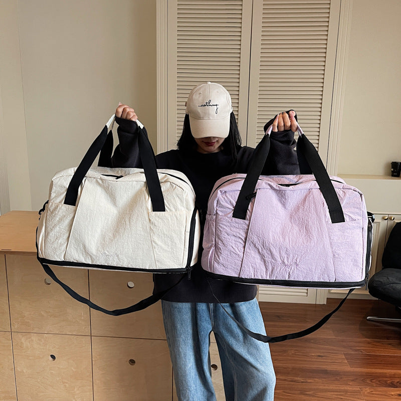 Sporty travel bag with practical outer pockets Kalsten