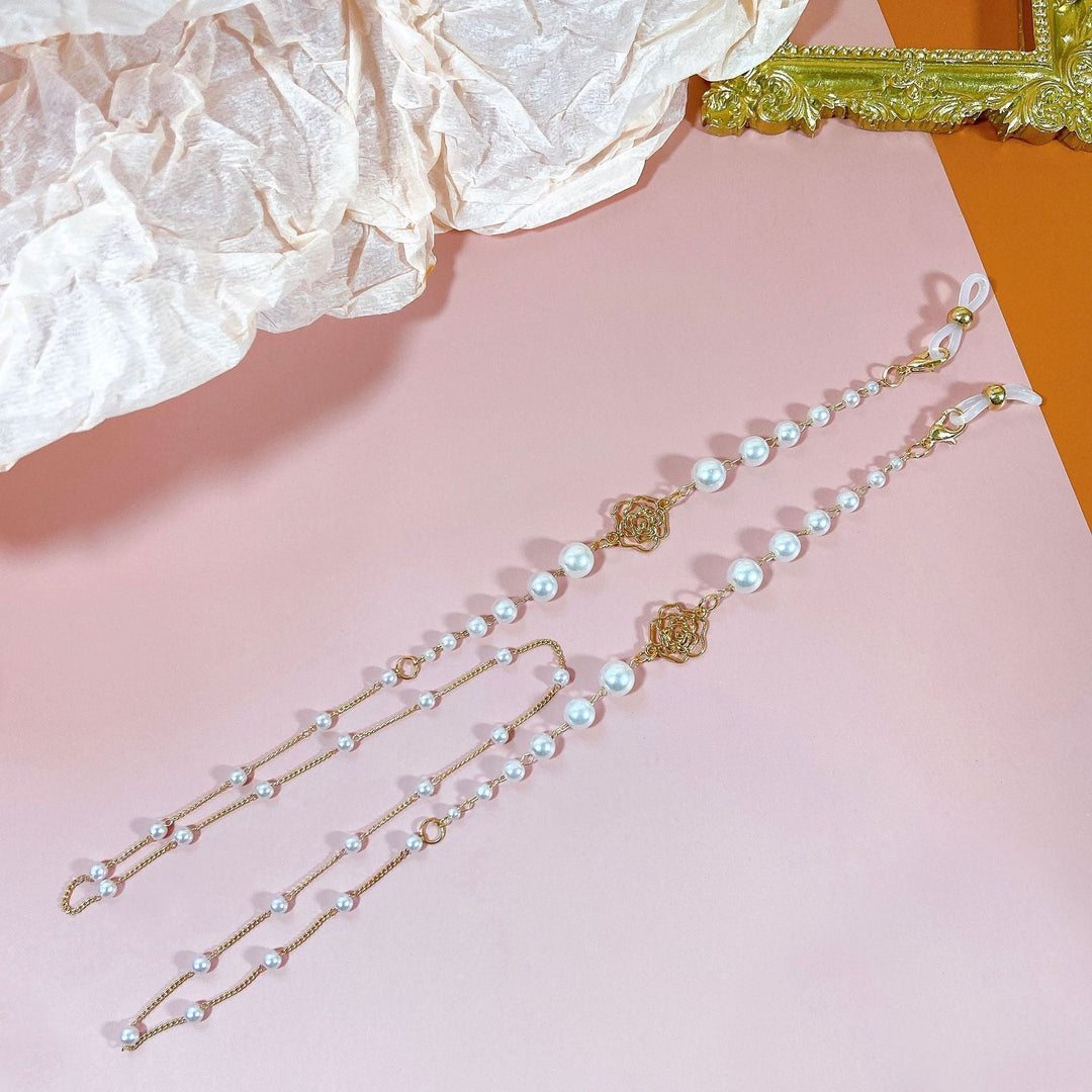 Sparkling glasses holder chain with pearls and floral pendants Kalsten