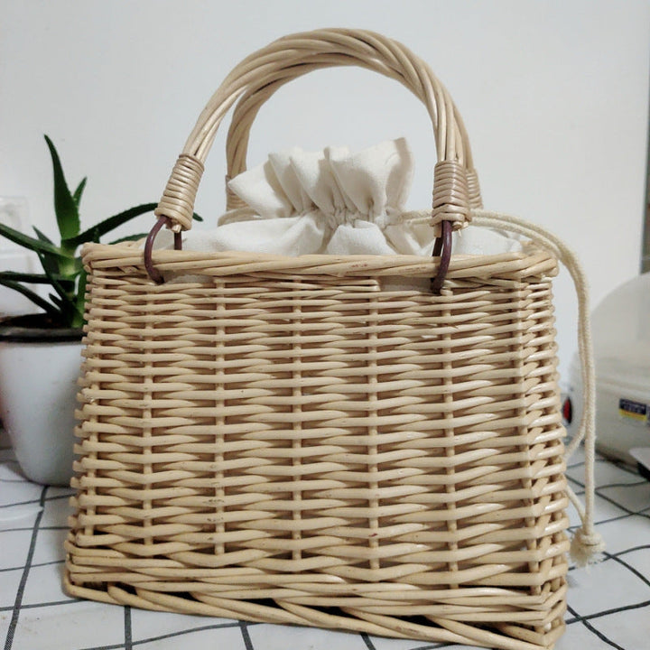 Women's handbag made of braided material with cotton drawstring closure Kalsten