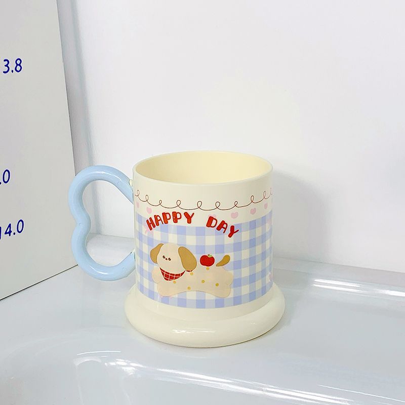 Ceramic mug with playful puppy motif Kalsten