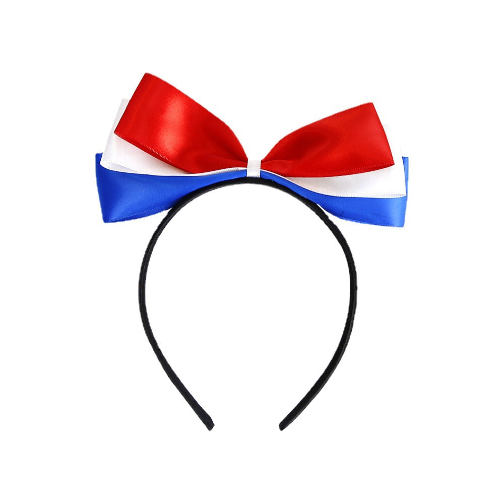 Ladies' festive hairband with pom poms, star embellishments, and glitter tinsel Kalsten