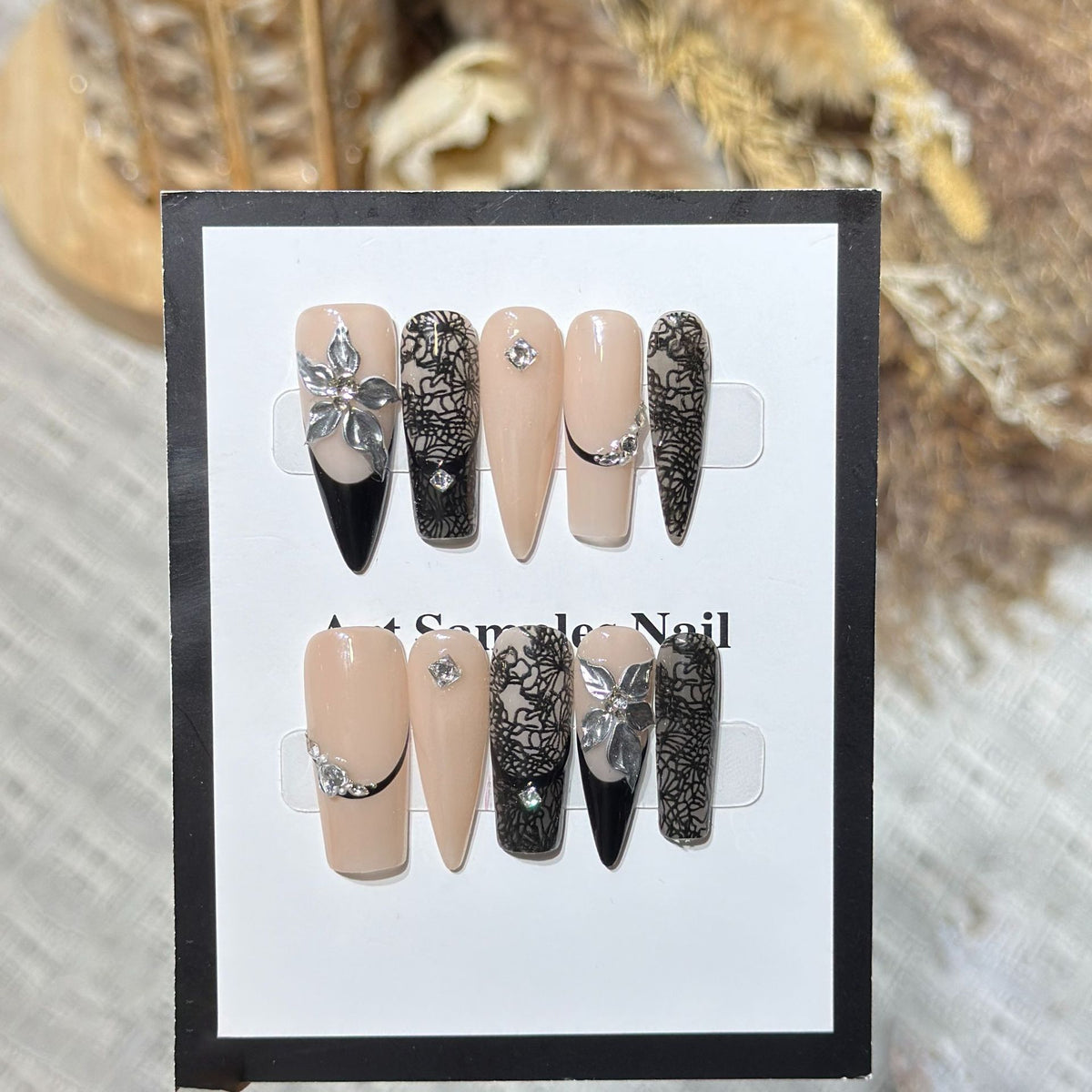 Artistic Stiletto Press-On Nail Set with Floral and Geometric Accents Acalora