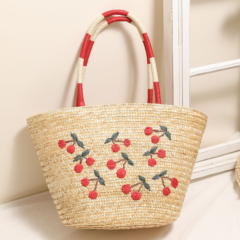 Handcrafted basket bag with vibrant floral embroidery design Kalsten