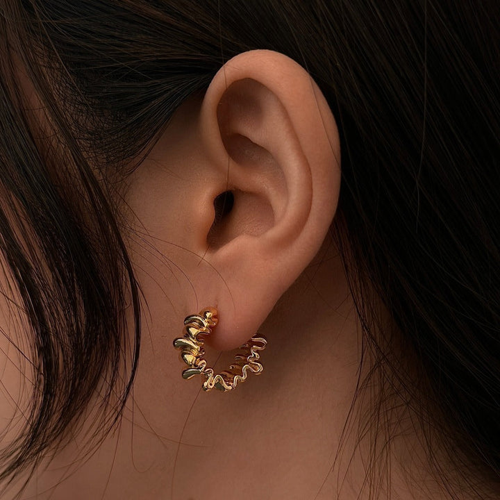 Stylish studs in modern ribbed design Kalsten