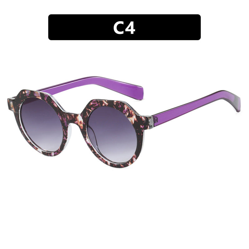 Ladies extravagant round sunglasses with colored accented frame Kalsten