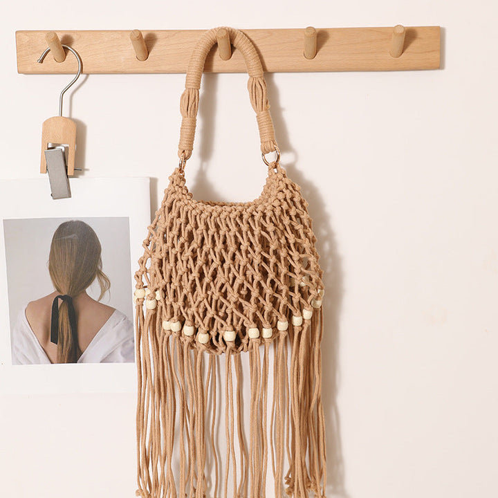 Macrame bag with decorative fringes and wooden beads Kalsten