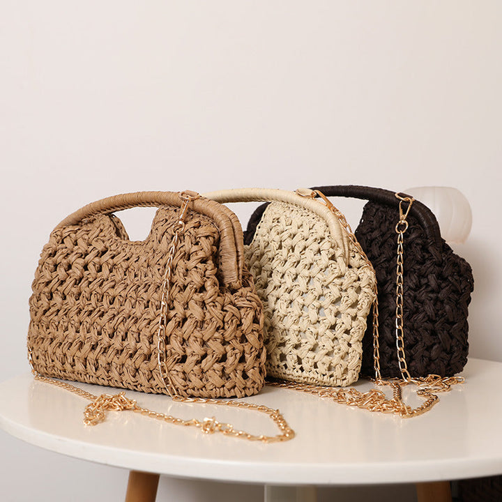 Handcrafted rattan bag with elegant handles and chain straps Kalsten