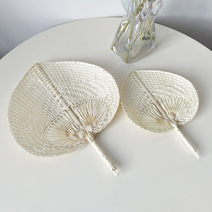 Women hand-woven fan made of natural material Kalsten