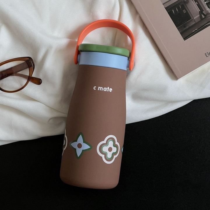 Women's ergonomic water bottle with practical carrying handle Kalsten