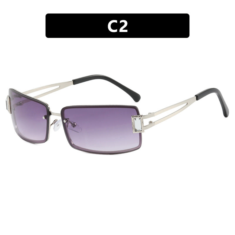 Ladies stylish sunglasses with elegant trapezoidal lenses and filigree metal frame Kalsten
