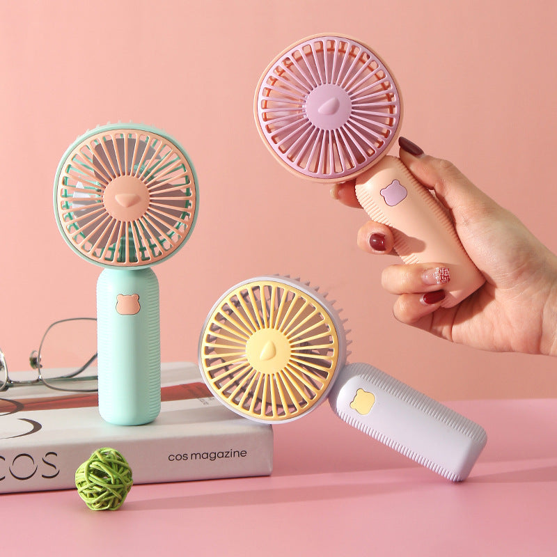Ladies compact handheld fan with ergonomic grip, quiet brushless motor, and removable stand Kalsten