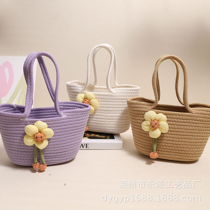 Handcrafted basket bag with floral accents Kalsten