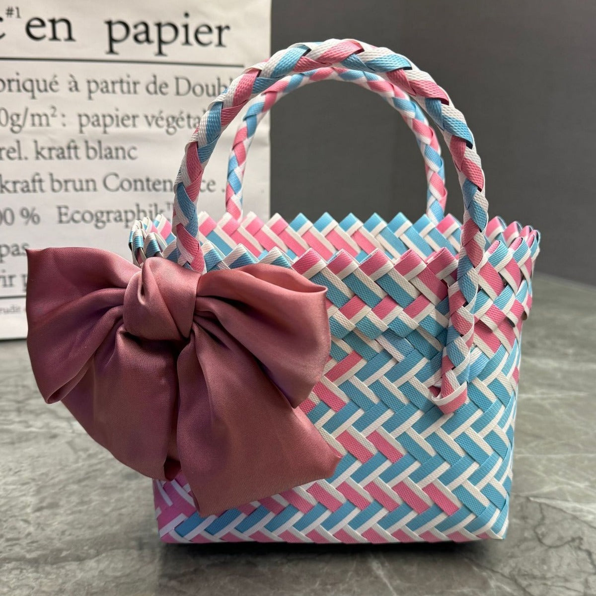 Playful basket bag with bow Acalora