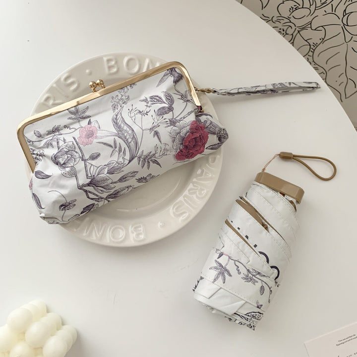 Ladies elegant folding umbrella with floral design and practical case Kalsten