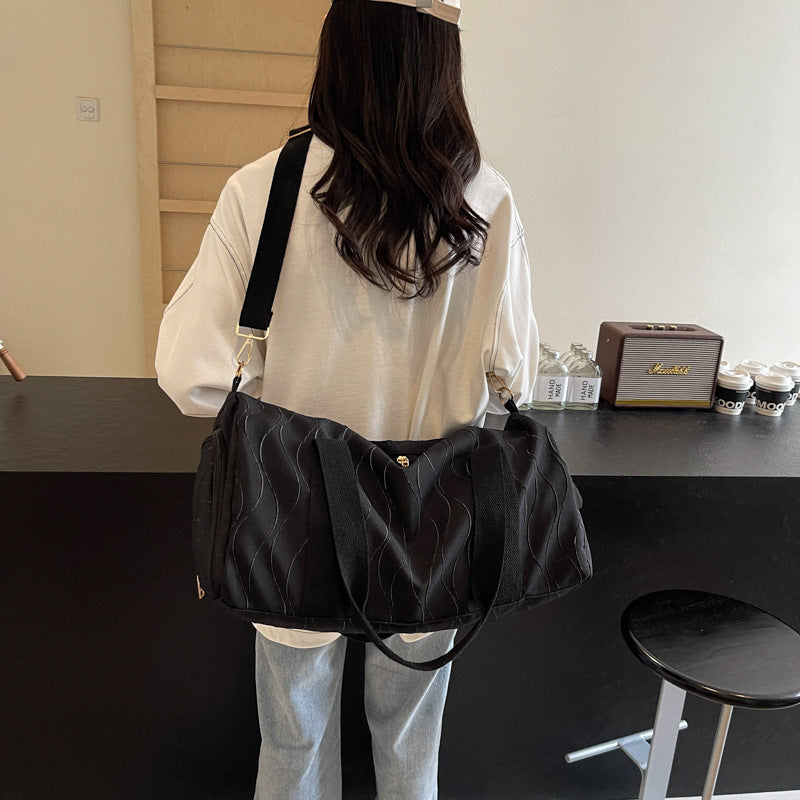Sporty travel bag with stylish wave pattern Kalsten