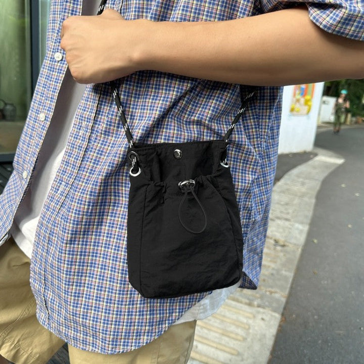 Mini Drawstring Crossbody Bag Kalsten