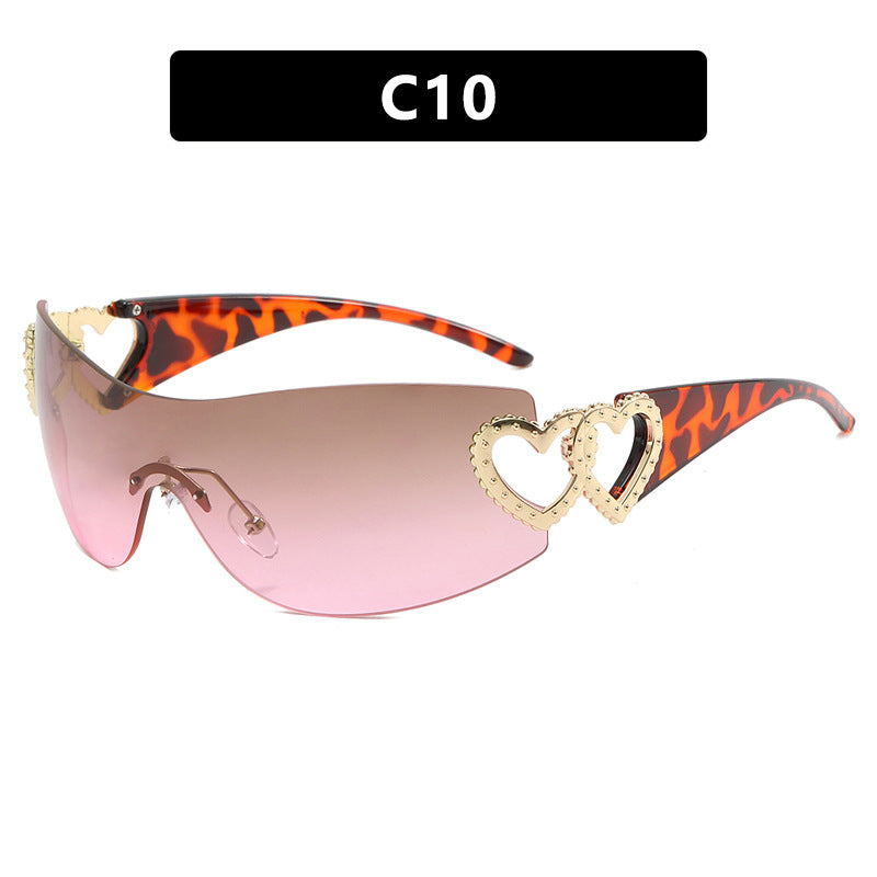 Ladies sporty sunglasses in trendy shield design with heart accents Kalsten