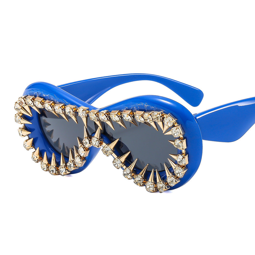 Women's fashionable sunglasses with extravagant spikes and crystal embellishments Kalsten